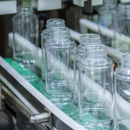 Máquina rotativa llenadora de envases PET en línea automatizada
